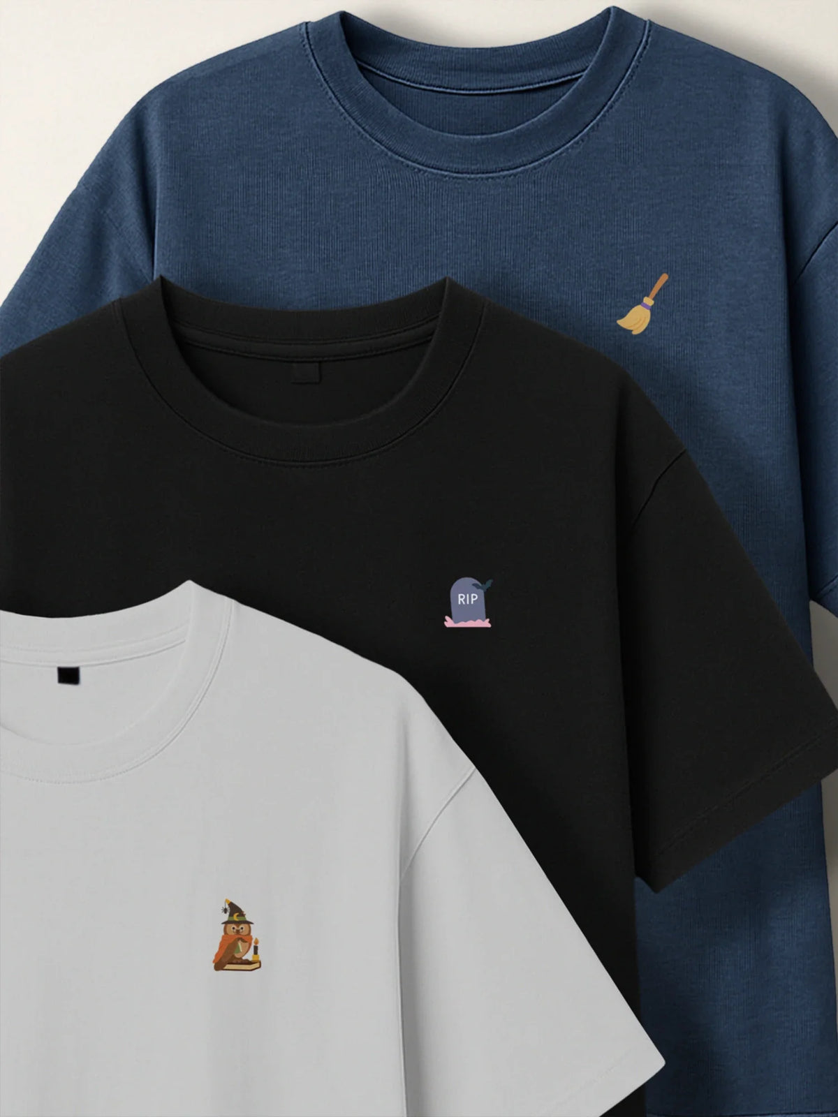 Blue, black and white t-shirts with Mini designs for the Halloween Minis collection by inspire.inc